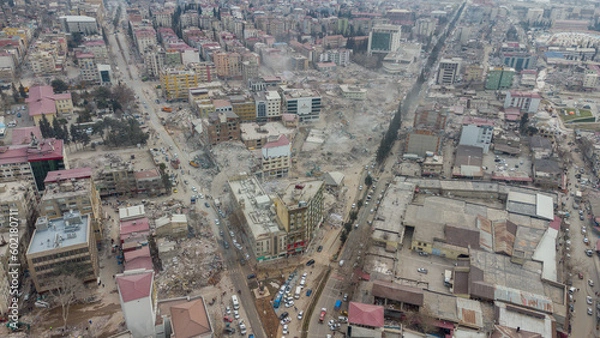 Fototapeta Turkey earthquake aerial view. Aerial view of collapsed buildings in Kahramanmaras