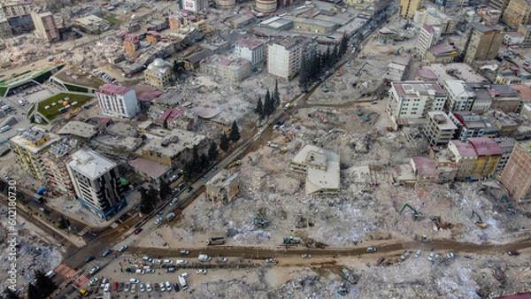 Fototapeta Turkey earthquake aerial view. Aerial view of collapsed buildings in Kahramanmaras
