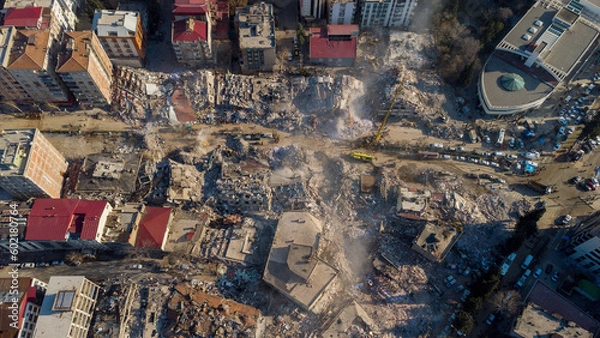 Fototapeta Turkey earthquake aerial view. Aerial view of collapsed buildings in Kahramanmaras