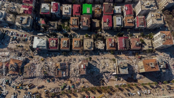 Fototapeta Turkey earthquake aerial view. Aerial view of collapsed buildings in Kahramanmaras