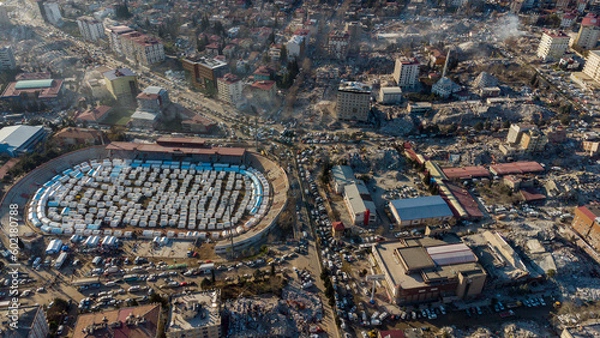 Fototapeta Turkey earthquake aerial view. Aerial view of collapsed buildings in Kahramanmaras