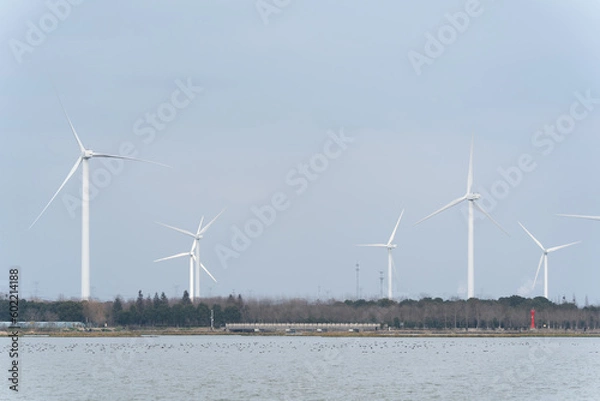 Fototapeta Wind turbines in the suburbs