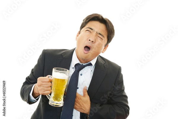 Fototapeta ビールを飲みすぎたサラリーマン