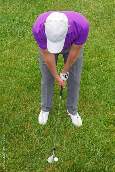 Fototapeta Golfer overhead shot from the rough.