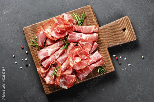 Fototapeta Cured Meat Platter, Coppa with Spices, Italian Antipasto, Appetizer over Dark Background