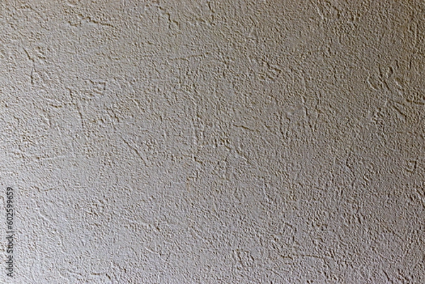 Obraz 弱い光に照らされて明暗が生じた壁
