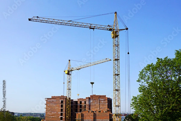 Fototapeta Construction of multi apartment building.