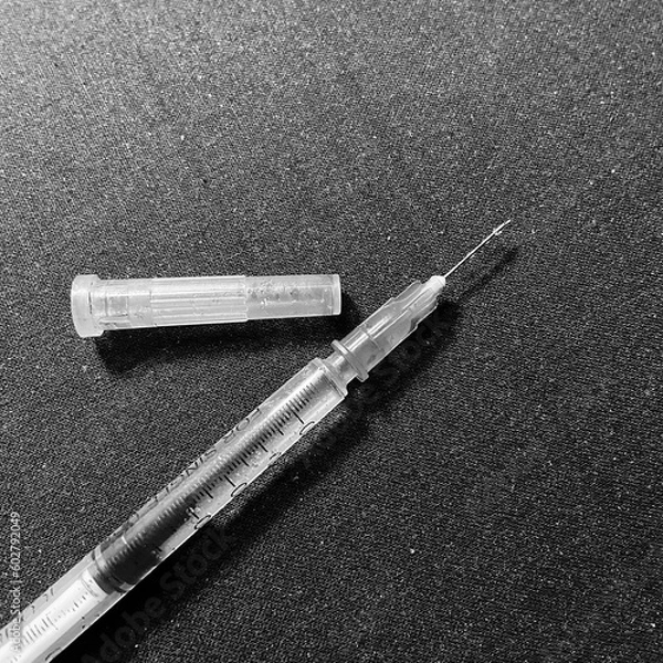 Obraz Tools for heroin and drug use. Spoon, syringe and blowtorch for smoking narcotic substances. Items for cocaine consumption. Image with neutral background.