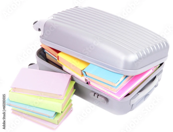 Fototapeta Suitcase with books isolated on white
