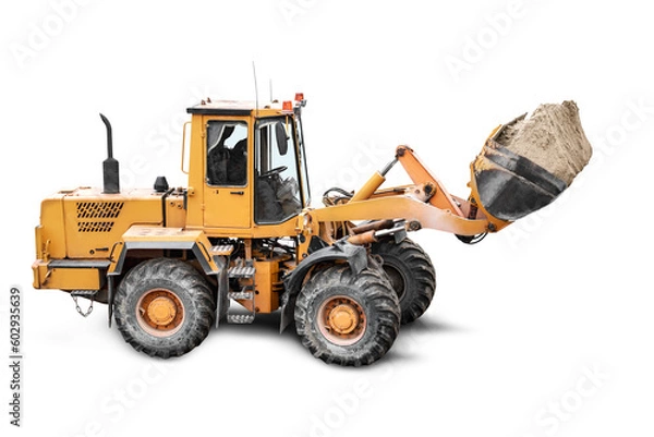 Obraz Heavy front loader or bulldozer on a white isolated background. construction machinery. Transportation and movement of bulk materials. Large bucket for earth, sand and gravel.