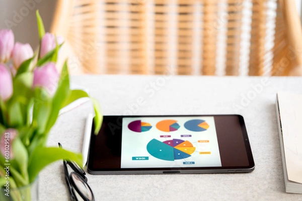 Obraz Tablet with business plan. Tablet with profit growth chart