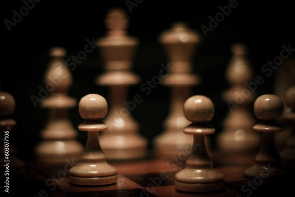 Obraz chess pieces on a chessboard