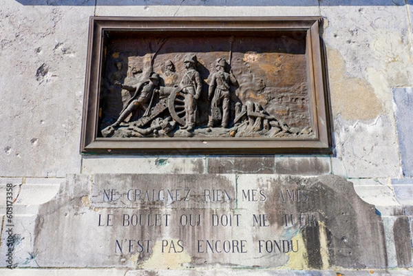 Fototapeta Bronze plaque on the pedestal of the equestrian statue of Napoleon on the Legion of Honor Square in the town of Montereau Fault Yonne in Seine et Marne, France