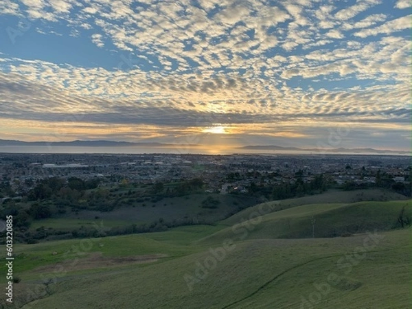 Obraz sunset in the hills with clouds