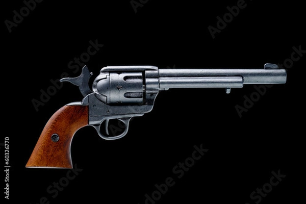 Obraz revolver pistol isolated on a black background