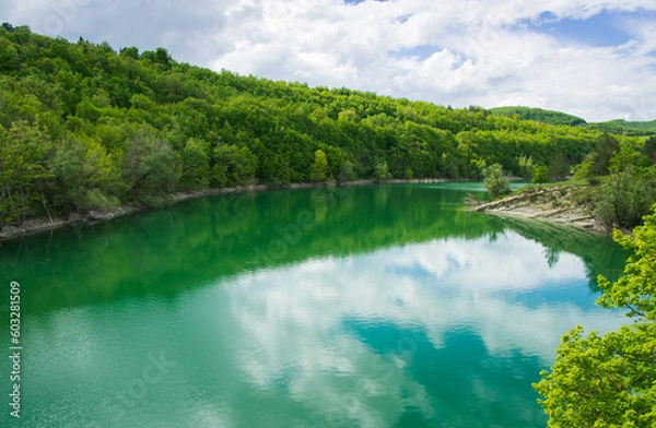 Obraz View of the reflection of the clouds on mountain lake in the Marche region Italy