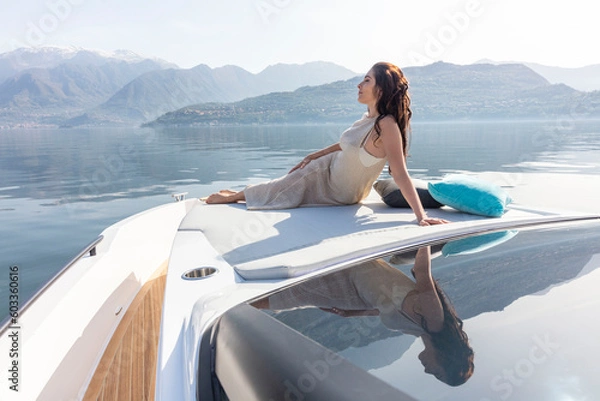 Fototapeta young amazing woman relax on the yacht