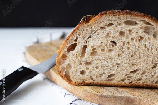 Obraz bread on the table with a knife