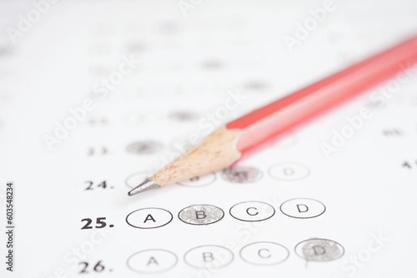 Obraz Answer sheets with pencil drawing fill to select choice, education concept.