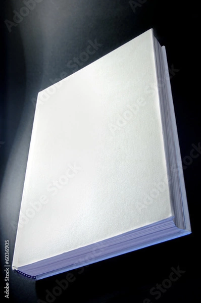 Fototapeta white book isolated on black background