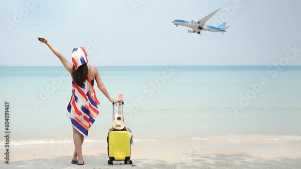 Fototapeta Summer Party. Traveler and tourism woman travel in summer on the beach and white sand. Asian relax with suitcase Happy and enjoyed for travel with plane and outdoor.on Summer Vacation