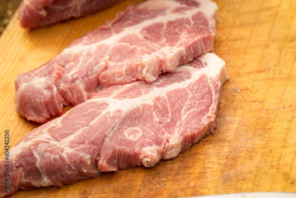 Fototapeta Raw neck on chopping board	