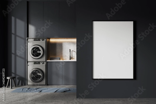 Obraz Grey laundry interior with washing machines, shelves and mock up frame