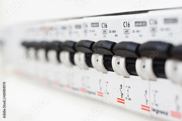 Fototapeta Closeup view of a box with automatic fuses
