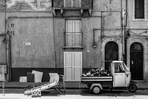 Obraz A Ape with melons/fruitshop in Sicily, Italy.
Black and white.