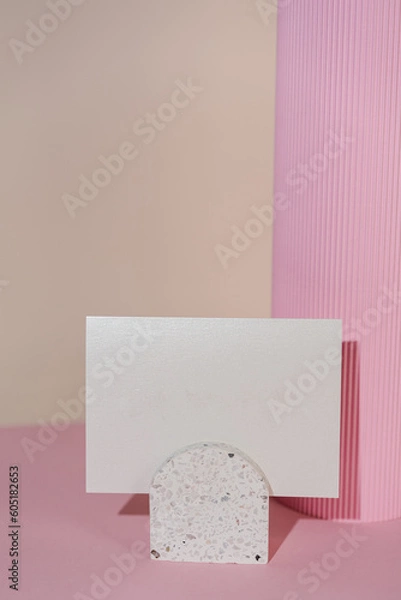 Fototapeta White glitter wedding invitation card mockup on pink background top view. Folded woman business card mock up. Name card, place card, birthday folded card mockup