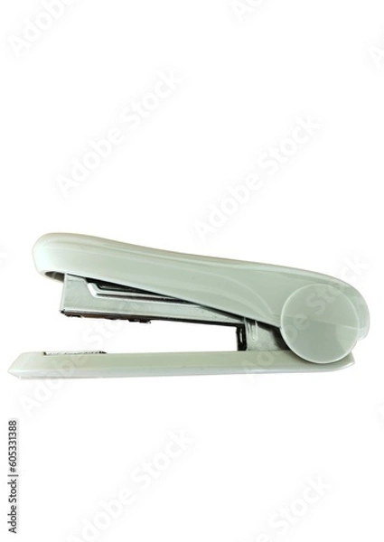 Fototapeta Plastic stapler isolated on a white background