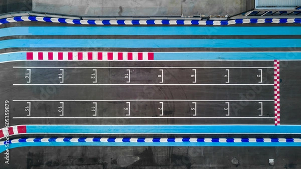 Obraz Aerial top view race kart track, Track for auto racing top view, Car race asphalt and curve street circuit, Aerial view asphalt race track.