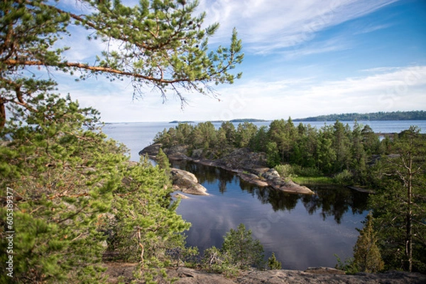Obraz Granite island of Sortavaly in summer under a blue sky. Top view of the lake and the stone islands