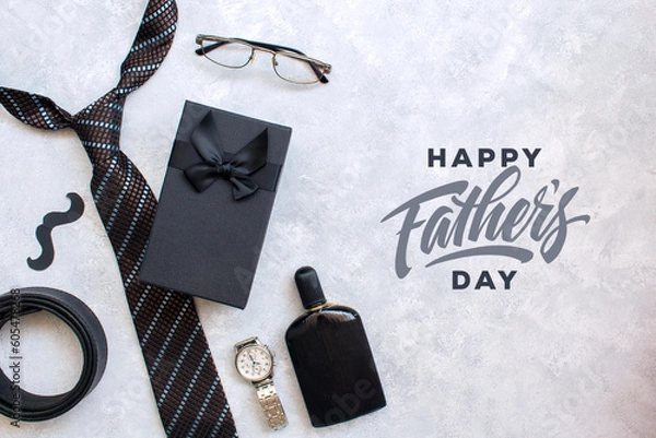 Fototapeta Design concept top view of Father's day gift idea with greeting on wood background.