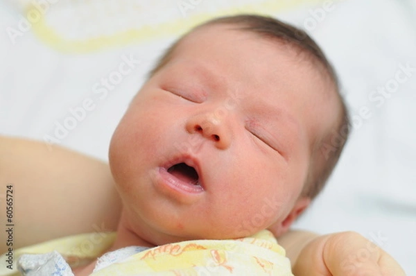 Fototapeta Baby sleeping with his mouth open