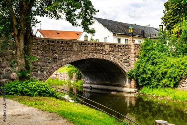 Fototapeta Old medieval stone bridge in Nyköping, Sweden.