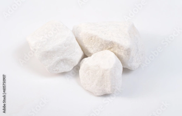 Fototapeta Dolomite mineral stones heep on white background.