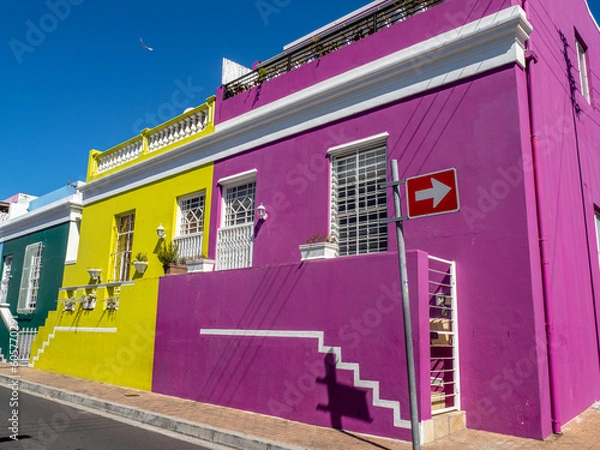 Fototapeta Colorful homes of Bo-Kaap in Capetown, South Africa, with deep blue sky in background.