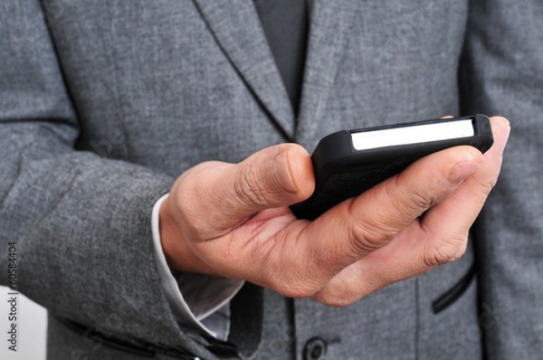 Fototapeta businessman using a smartphone