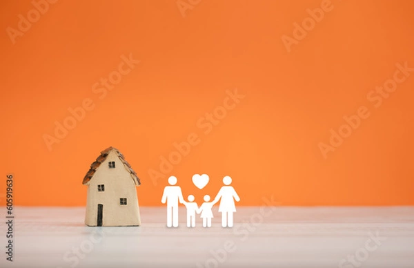 Obraz family icon and home model on orange color background