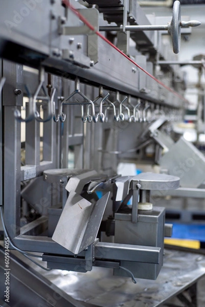 Fototapeta Large poultry farm processing workshop with automated conveyor systems, ensuring high-quality production, efficient packaging, and strict hygiene standards