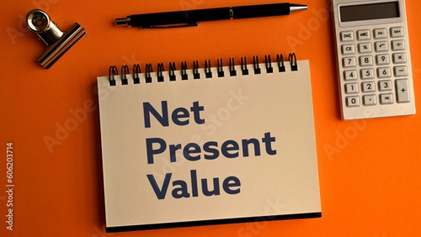Fototapeta There is notebook with the word Net Present Value. It is as an eye-catching image.