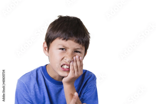 Obraz Young boy with toothache - on white background