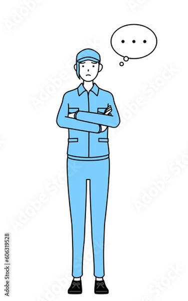 Fototapeta 腕を組んで考える帽子と作業着姿の女性