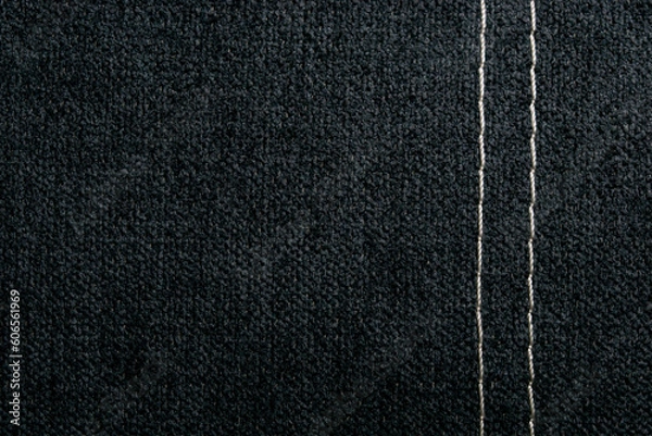 Fototapeta dark gray fabric texture background, white thread seam