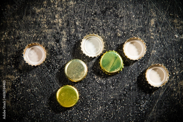 Obraz Several beer bottle caps.