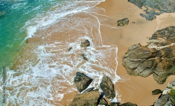 Fototapeta Beach with sand and rocks