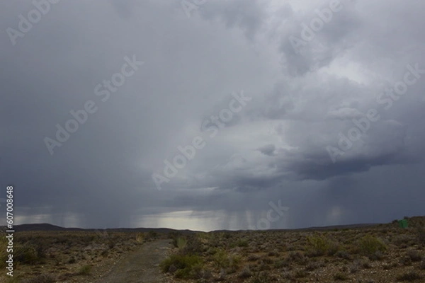 Fototapeta storm clouds over the dessert