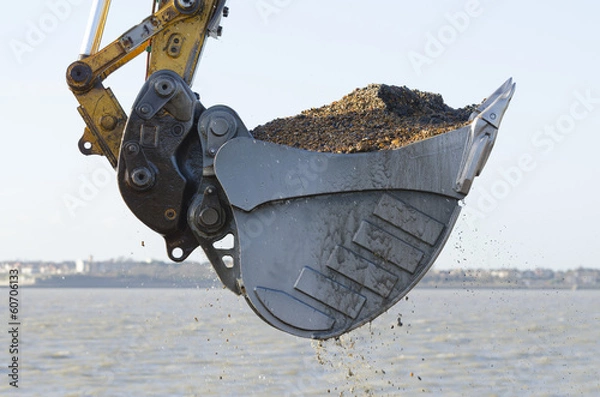 Obraz Excavator dredging a harbor