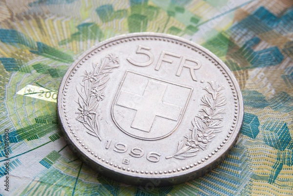 Obraz swiss franc coin on banknote